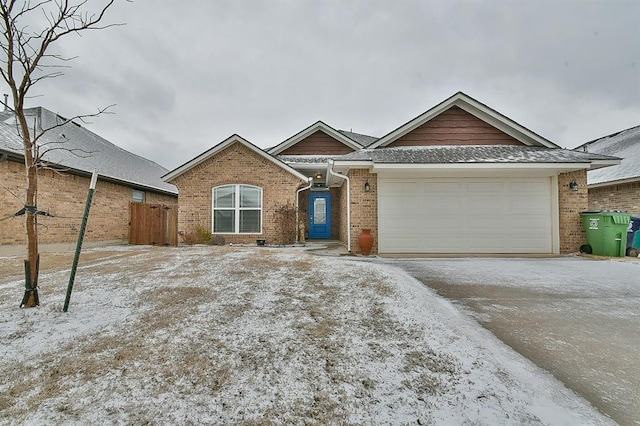 single story home with a garage