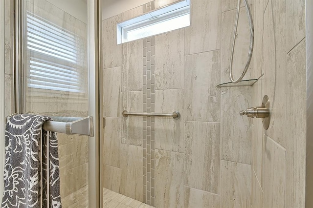 bathroom with an enclosed shower