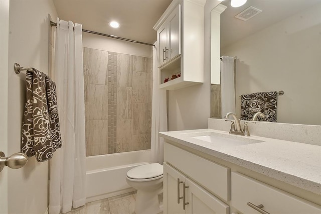 full bathroom featuring shower / bathtub combination with curtain, vanity, and toilet