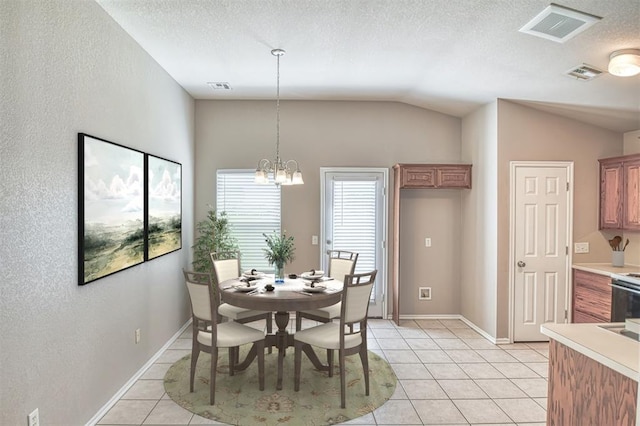 dining room featuring light tile patterned flooring, vaulted ceiling, a chandelier, baseboards, and a textured ceiling