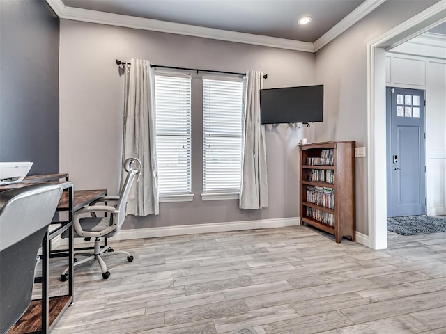 office space with ornamental molding and light wood-type flooring