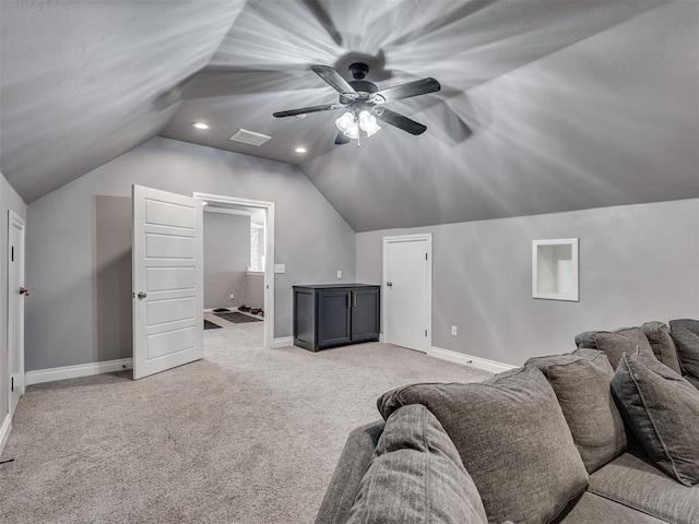 interior space featuring ceiling fan and lofted ceiling