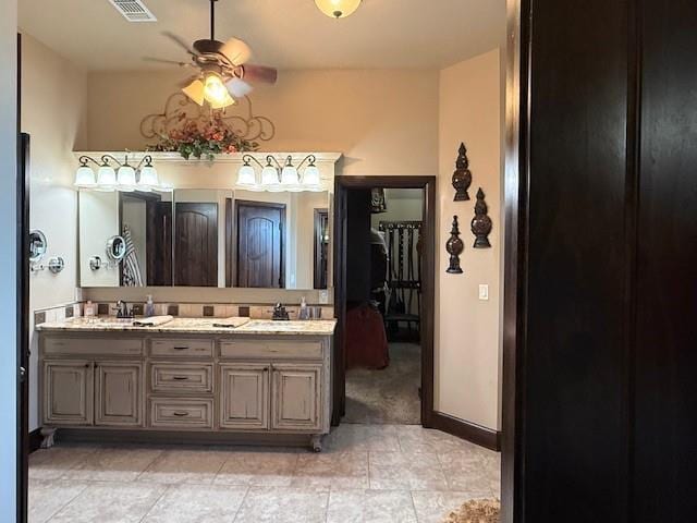 bathroom with vanity and ceiling fan