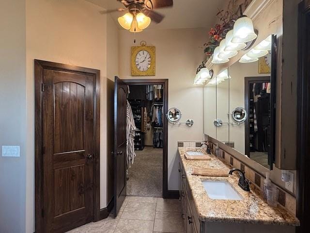 bathroom featuring vanity, tile patterned floors, and ceiling fan