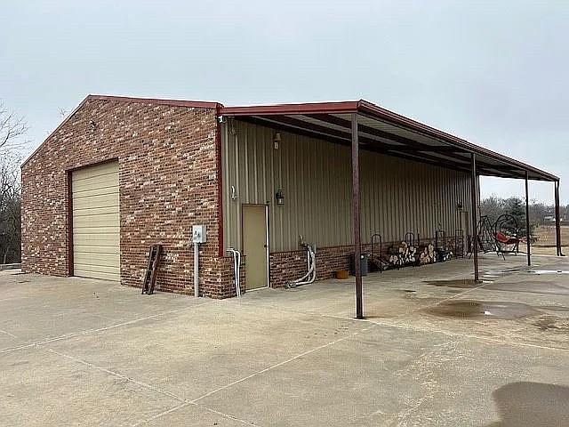 view of outdoor structure with a garage