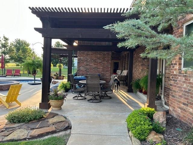 view of patio featuring a pergola