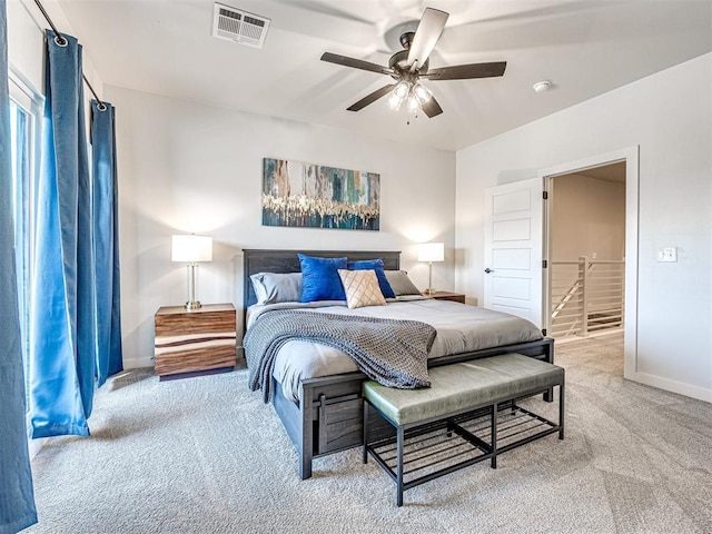 carpeted bedroom featuring ceiling fan