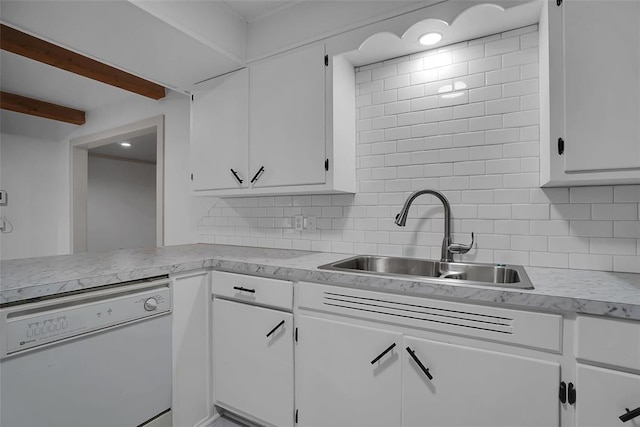 kitchen featuring sink, dishwasher, beam ceiling, tasteful backsplash, and white cabinets