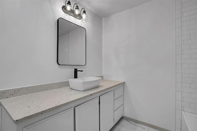 bathroom with vanity and shower with separate bathtub