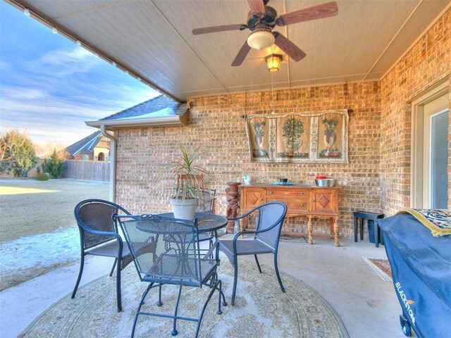 view of patio / terrace featuring outdoor dining space and ceiling fan
