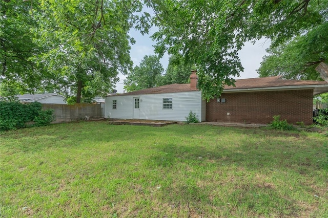 3000 N Viewpoint Dr, Midwest City, OK 73110 - back of house with a chimney