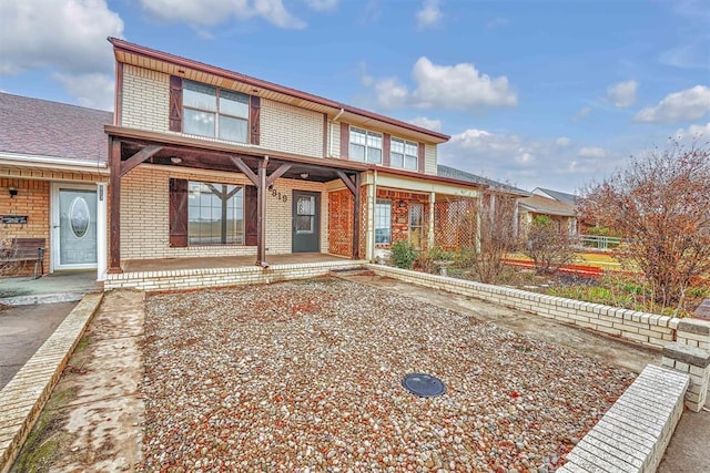 view of front property with covered porch