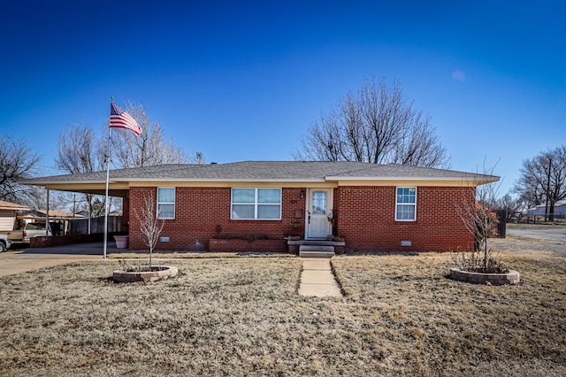 ranch-style home featuring a carport