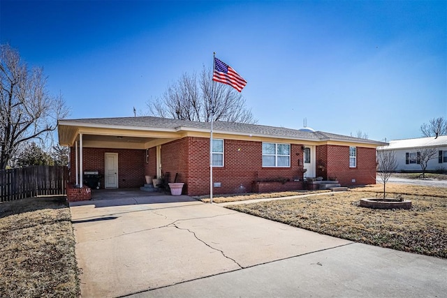 ranch-style house with a carport