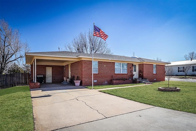 404 N Bryan Ave, Mangum, OK 73554 - ranch-style home with driveway, brick siding, an attached carport, crawl space, and roof with shingles