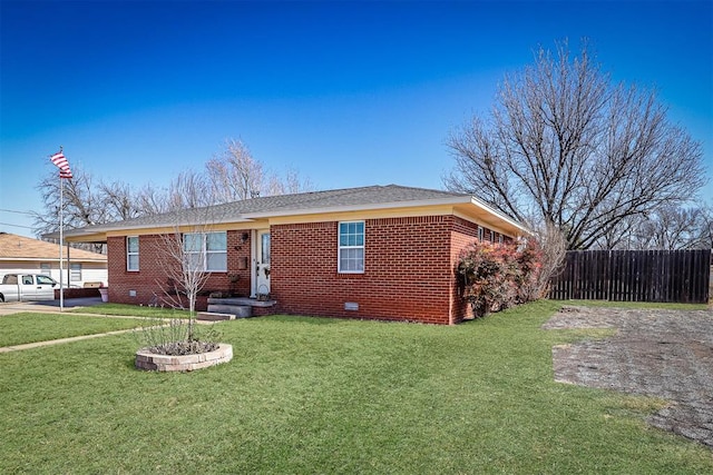 404 N Bryan Ave, Mangum, OK 73554 - ranch-style house with brick siding
