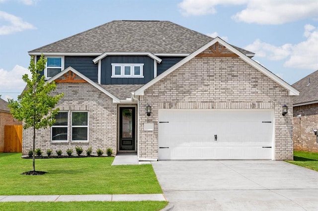 craftsman inspired home with a garage and a front lawn