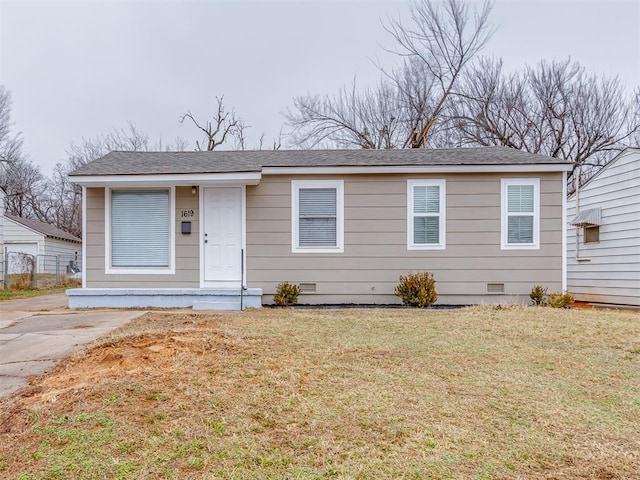 view of front of home with a front lawn