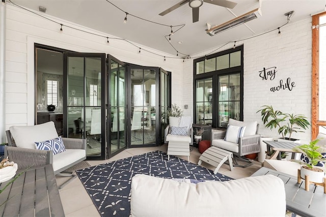 view of patio featuring outdoor lounge area and a ceiling fan