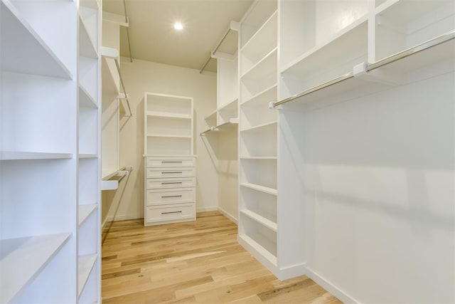 walk in closet featuring light wood-type flooring