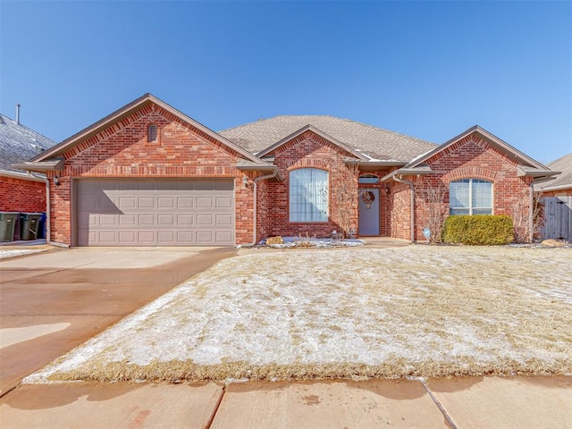 ranch-style home featuring a garage