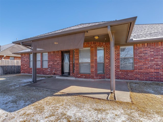 rear view of house featuring a patio area