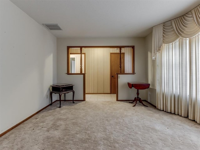 7000 N Libby Ave, Oklahoma City, OK 73132 - spare room featuring light carpet