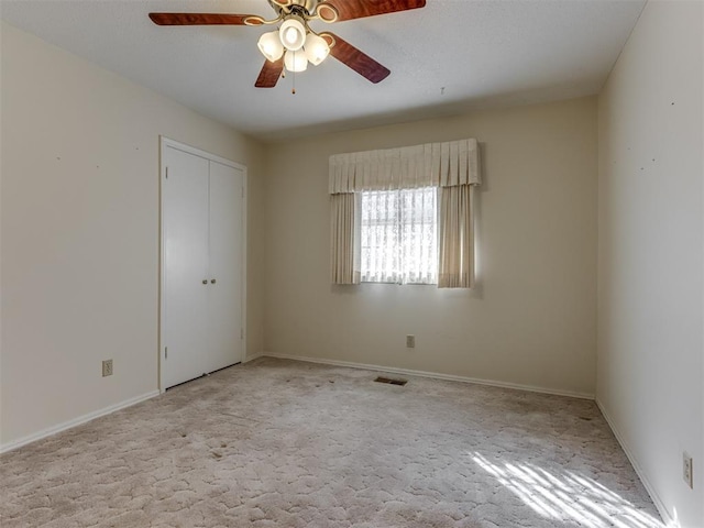 7000 N Libby Ave, Oklahoma City, OK 73132 - unfurnished room featuring light colored carpet and ceiling fan