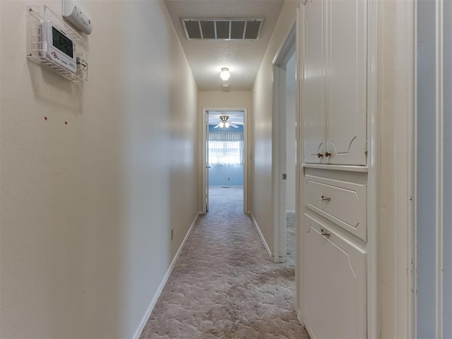7000 N Libby Ave, Oklahoma City, OK 73132 - corridor featuring light carpet