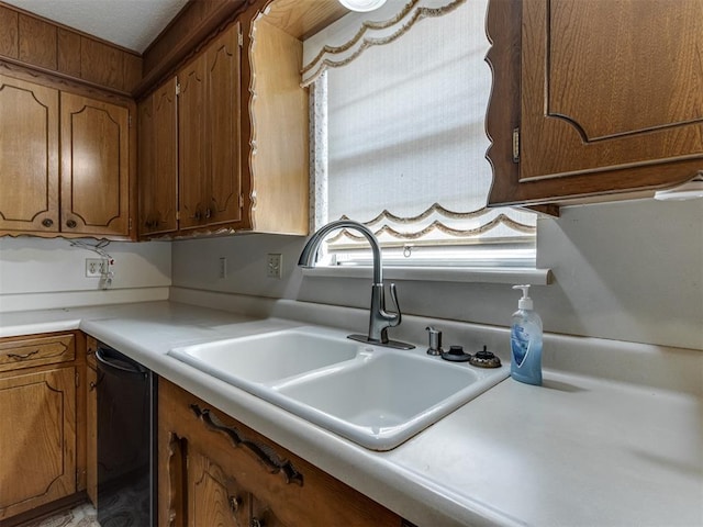 7000 N Libby Ave, Oklahoma City, OK 73132 - kitchen featuring sink and black dishwasher