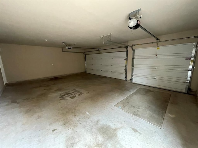 garage featuring a garage door opener