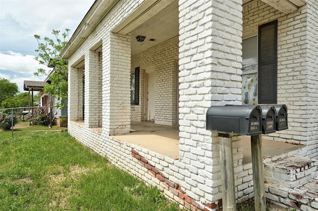 1315 NW 7th St, Oklahoma City, OK 73106 - view of side of property with a lawn and brick siding