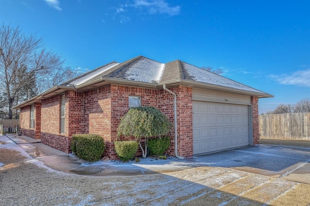 view of property exterior with a garage