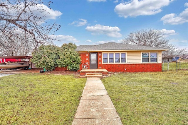 bungalow-style home with a front lawn