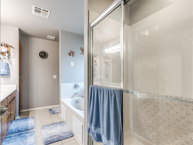 full bath featuring a garden tub, visible vents, a stall shower, vanity, and tile patterned flooring