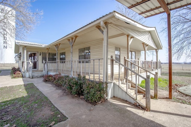 exterior space featuring covered porch