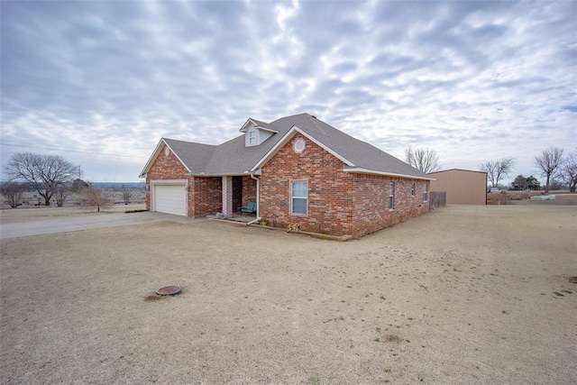 front of property with a garage