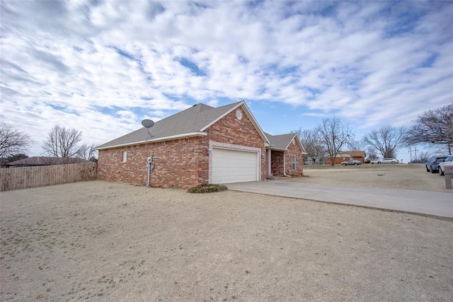 view of property exterior with a garage