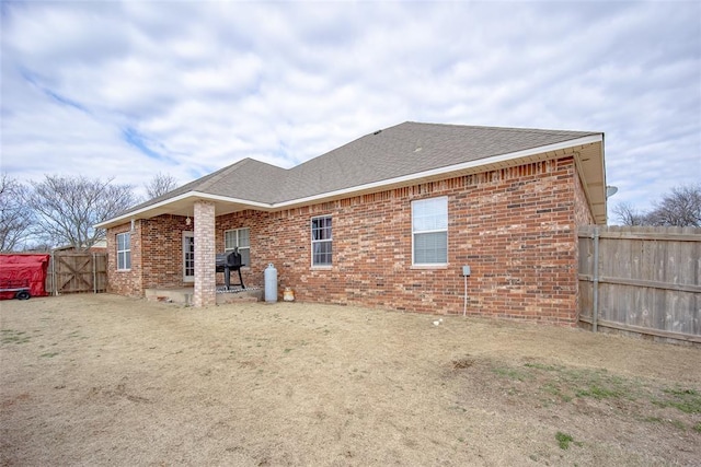 rear view of house with a patio