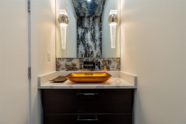 bathroom with vanity and backsplash