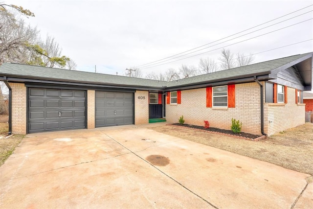 ranch-style home featuring a garage