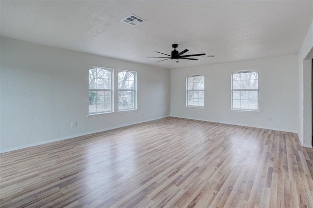 unfurnished room featuring ceiling fan and light hardwood / wood-style flooring