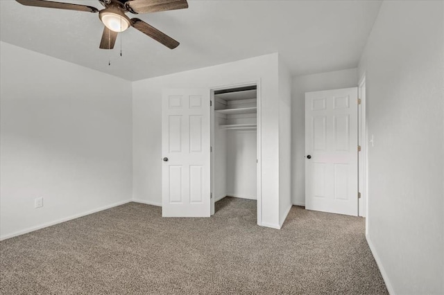 unfurnished bedroom featuring carpet flooring, ceiling fan, and a closet