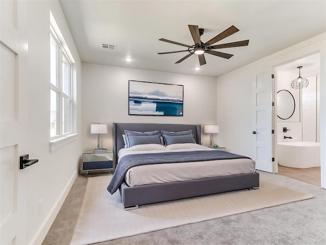 bedroom featuring visible vents, baseboards, carpet floors, and ceiling fan