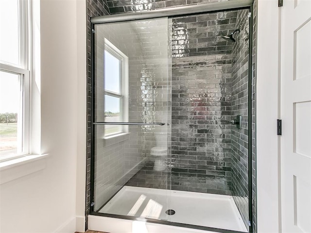 bathroom with a stall shower