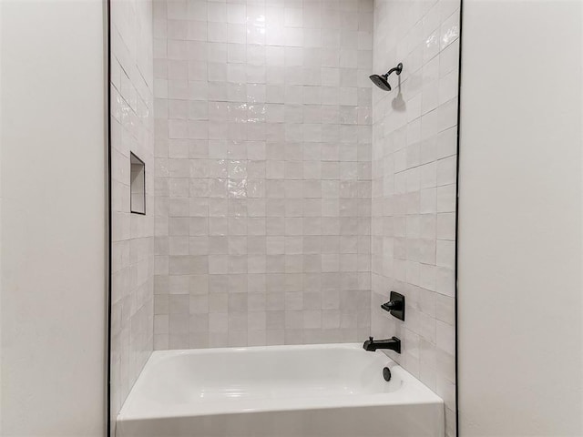 bathroom with shower / tub combination