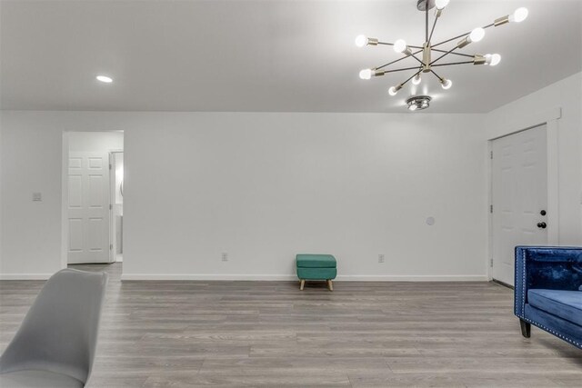 1617 NW 31st St, Oklahoma City, OK 73118 - sitting room featuring light hardwood / wood-style floors and a chandelier