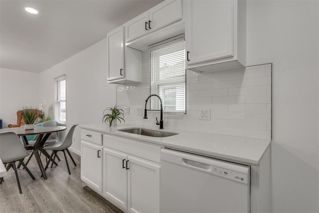 1617 NW 31st St, Oklahoma City, OK 73118 - kitchen featuring white cabinetry, dishwasher, and sink