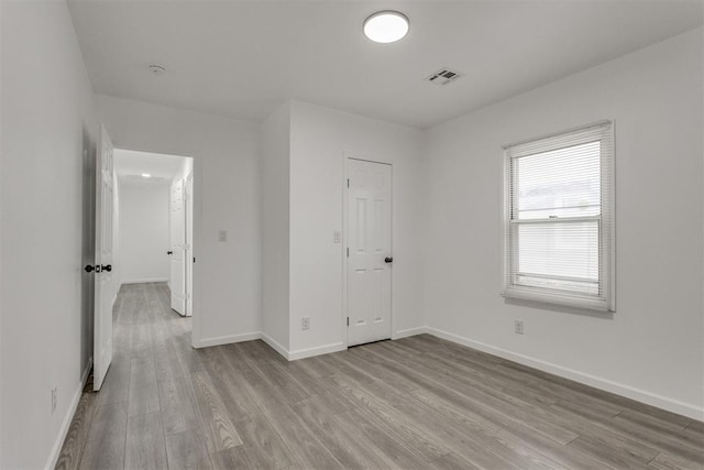 1617 NW 31st St, Oklahoma City, OK 73118 - unfurnished room featuring light hardwood / wood-style floors