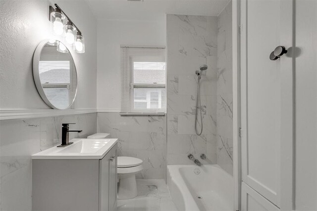 1617 NW 31st St, Oklahoma City, OK 73118 - full bathroom with tiled shower / bath combo, vanity, tile walls, and toilet